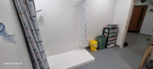 The bathroom at Trisor before installation and renovation was completed by 24 NRG Group.