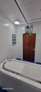 Interior view of the bathroom renovation and installation project performed for Tresor short break services. Completed by 24 NRG Group.
