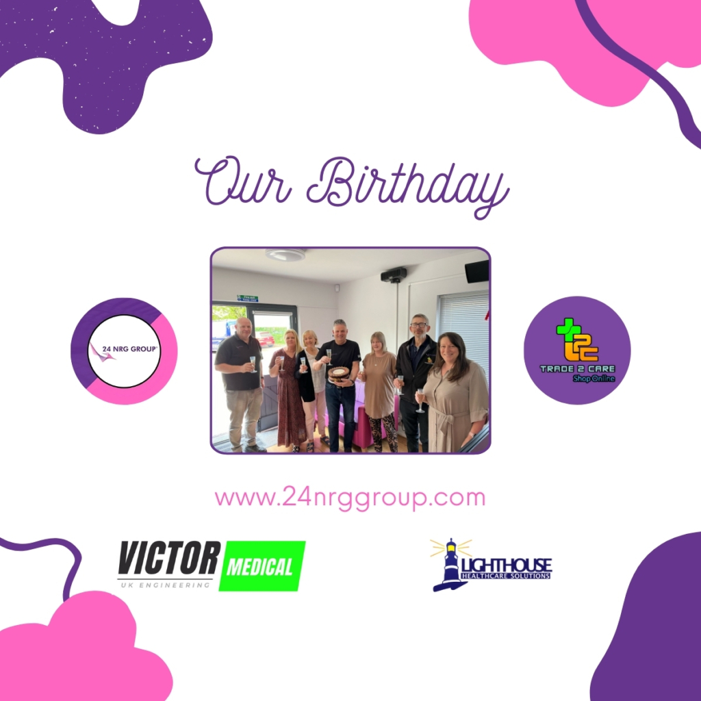 24 NRG team celebrating 20th anniversary with cake and toast